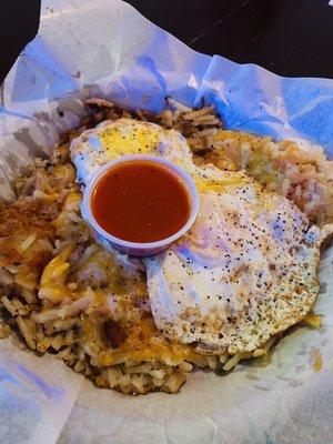 Breakfast Hashbrowns.  Loaded with American cheese, bacon and eggs cooked to your preference!!  And not just for breakfast.