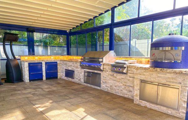 Outdoor Kitchen featuring twin eagles gas grill, pizza oven, and patio heater