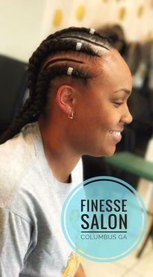 Fun yet relaxing environment servicing men women and children open 5 days a week. Color cuts natural hairstyles and more!