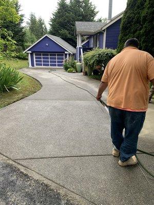 Washing exposed aggregate driveway