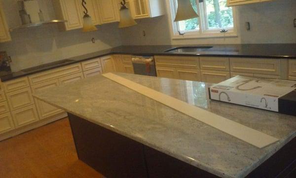 Kitchen remodeling cabinets and granite installation.