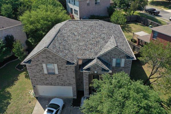 Laminated Asphalt Shingles. Owens Corning Duration Designer Lifetime Roofing System. Storm Cloud color