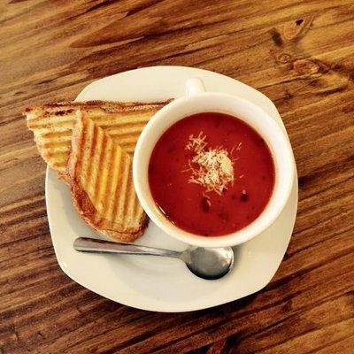 Grilled Cheese Panini Sandwich with homemade Roasted Tomato Basil Soup.  All of our soups are gluten free.