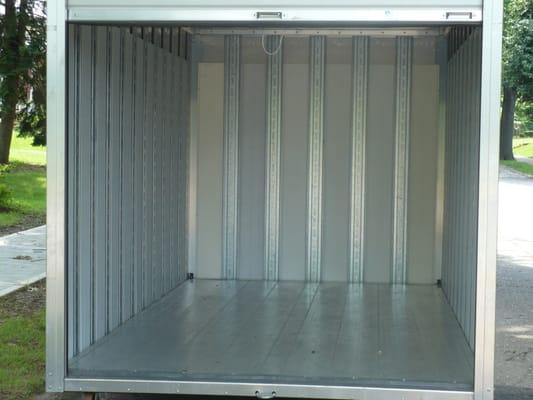 Inside of our Mobile Attic Storage Unit. Unlimited opportunities for mounting straps, wardrobe bars, and hanging shelves.