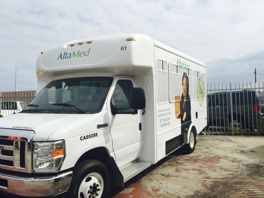 Vehicle wrap on a AltaMed passenger van.