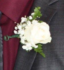 Husband's boutonnière on his lapel