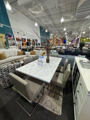 Real Marble Table!!!! Great quality and stainless bottom, not chrome.  Gorgeous