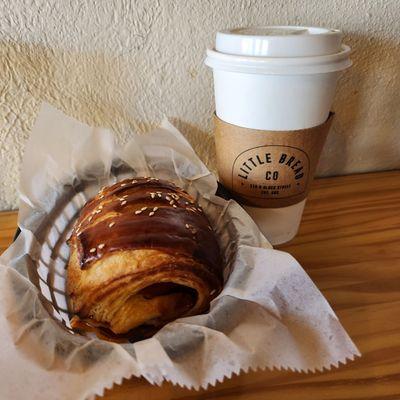 Ham and cheese croissant and drip coffee. Delicious pastry!