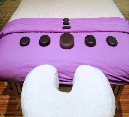 Massage Art Studio offers Hot Stone Therapy.