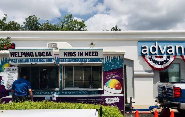 Our free snow cone event!! Each free snow cone donated to helping end childhood homelessness and hunger!