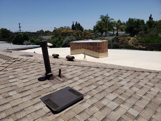 new shingles @ the pitch roof, and adhered tpo @ the flat roof