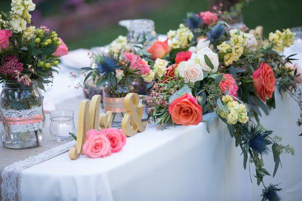 The colors of our wedding flowers were spectacular!  Perfectly done!  Gray's Flower Garden. Photos by Bogdan Condor Photography.