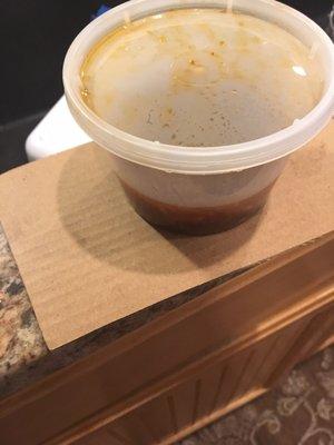 They used cardboard to separate/stabilize my soup in my to go bag.