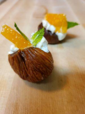 Turkish  Figs filled with Honey Goat Cheese , Crowned with fresh Mediterranean Citrus and Mint