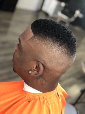 High skin fade with curls