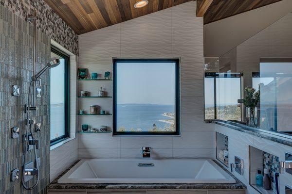 A master suite remodel with a view of Puget Sound in Innis Arden. This spa is a little piece of heaven for these busy homeowners.