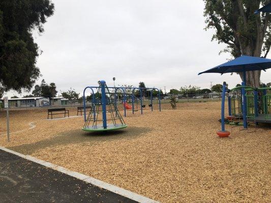 Spinning climber and bench's for parents.