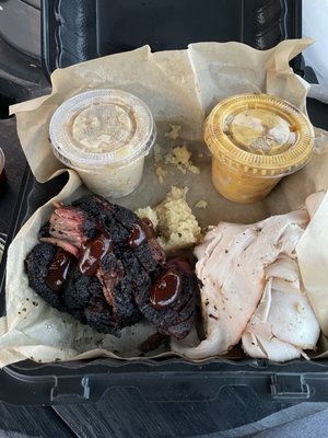 Beef brisket, pit turkey, Mac and Cheese and cheesy potato.