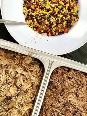 Carnita pork, beef barbacoa, and fiesta corn salad