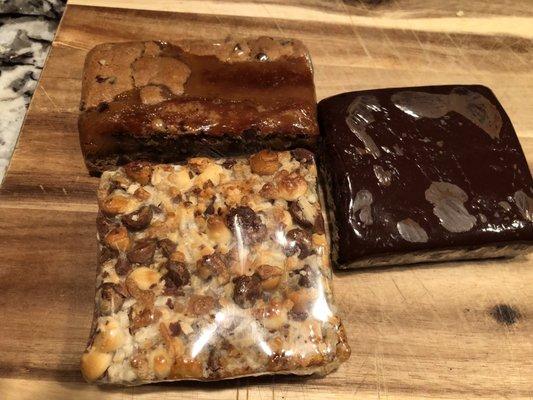 Peanut butter chocolate chip brownie, ganache brownie, and 7 layer bar