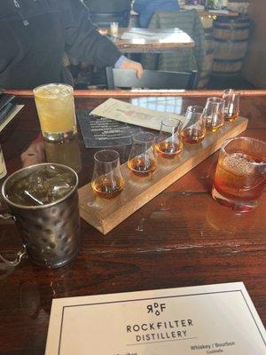 Flight of whiskey, stubborn mule, whiskey sour, and Manhattan