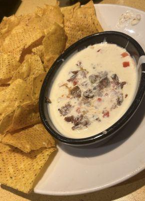 White queso dip w brisket and chips