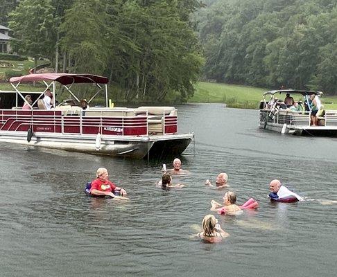 1 of the 3 pontoon boats. We carried our own music on board