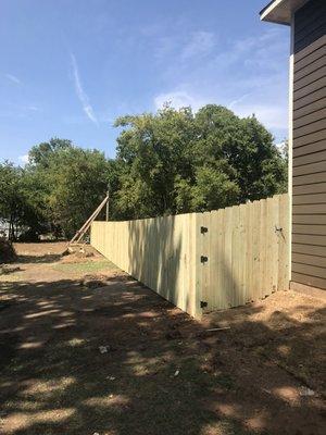 6' Pine Fence. Pottsboro, TX. Built for a new duplex