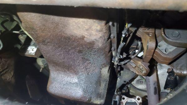 Rusted and destroyed oil pan