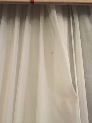 Eww! Stains on curtains.