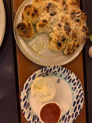 Garlic knots with homemade white sauce and red sauce. Amazing!