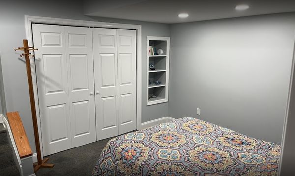 Basement remodel: new carpet, vinyl flooring, drywall, fresh paint, stabilized ceiling joists.