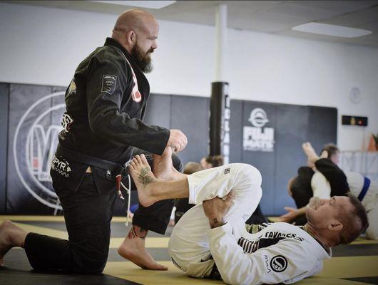 Professor Barnes working with his coach, Professor Piet Wilhelm.