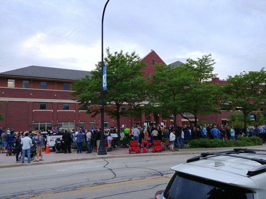 Friday concert... forgot why... People blocking sidewalk by library with chairs, blankets, etc.