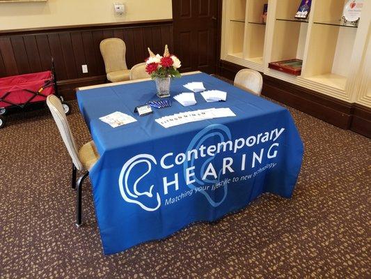 Contemporary Hearing at a local health fair in a retirement facility