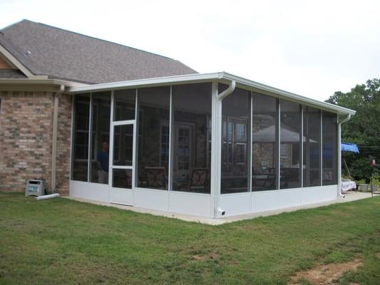 Covered screen porch on customer's existing concrete patio slab.