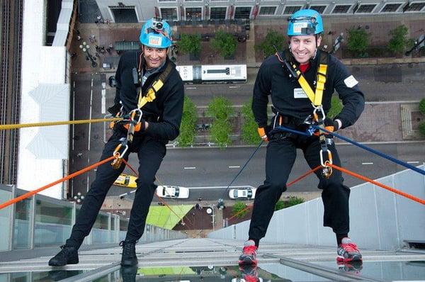 Rappelling The Wit Hotel for charity.