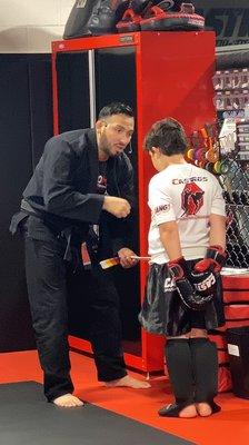 Earning his black stripe with Mr Castro