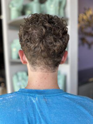 Shirt curly haircut from behind