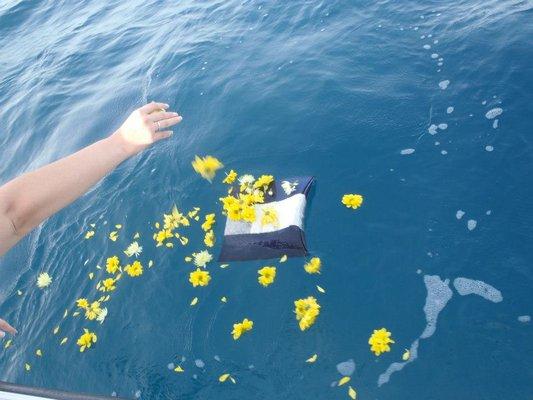 Biodegradable urn with flowers