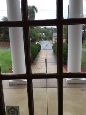 Beautiful hedge-lined walkway to the front door.