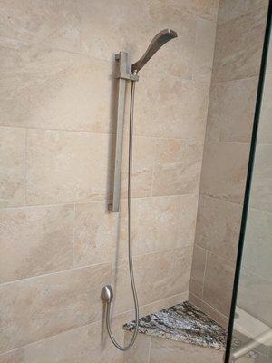 Handshower within reach of shower seat for ease of use