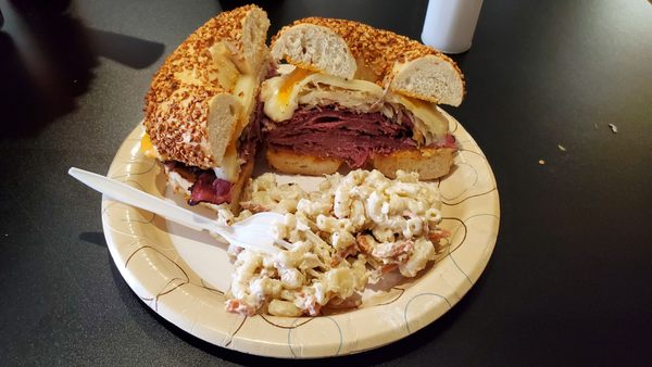 Awesome pastrami Reuben with macaroni salad.