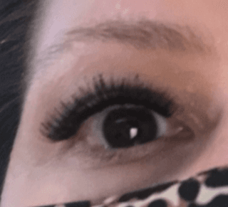 You can see some of the clumps of glue in the lashes here and how they are stuck together.