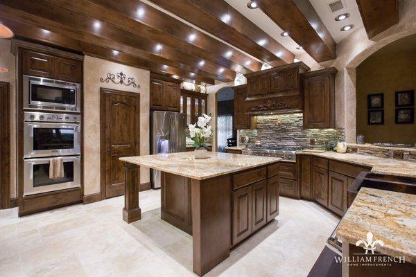 LAKE DALLAS: custom cabinets and staining, travertine floors, granite countertops, new recess can lights and stone backsplash