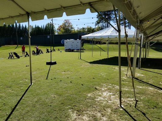 string lighting in between the 2 20x30 tents to make a patio