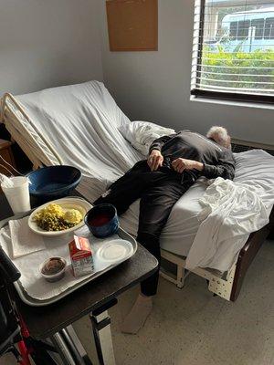 My dad laying in bed not being able to get up, food left in front of him! This is an Alzheimer's patient