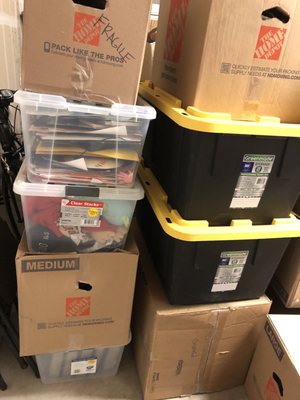 Bins & boxes left in the garage like this. The boxes were being crushed