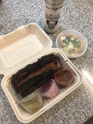 1/2 lb brisket with pickles, onions, and sauce. Street corn side and beer from the humble monk. Life is good.