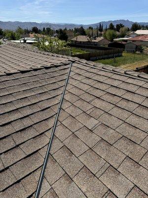 Walking the roof for the inspection, checking materials and flashing.